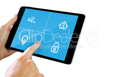 Composite image of man using tablet pc