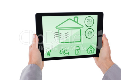 Composite image of cropped hand of man holding digital tablet