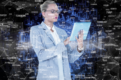 Composite image of businesswoman using digital tablet