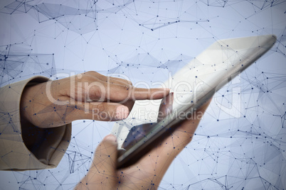 Composite image of female hands holding tablet pc