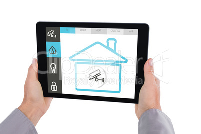 Composite image of cropped hand of man holding digital tablet