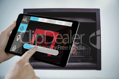 Composite image of man using tablet pc