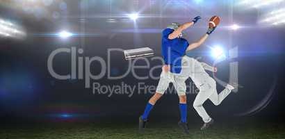 Composite image of businessman tackling a football player