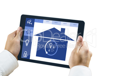 Composite image of man using tablet pc