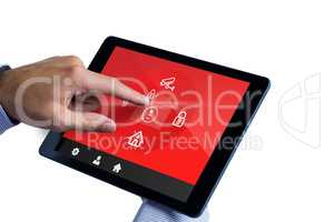 Composite image of man using tablet pc