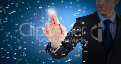 Composite image of businessman pointing these fingers at camera