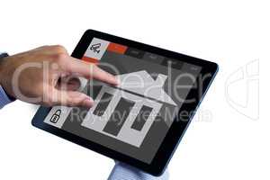 Composite image of man using tablet pc