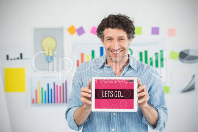 Composite image of businessman showing digital tablet with blank