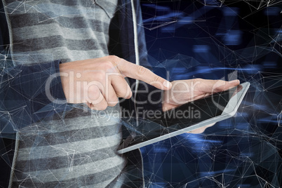 Composite image of cropped image of man using tablet