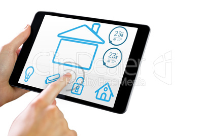 Composite image of man using tablet pc