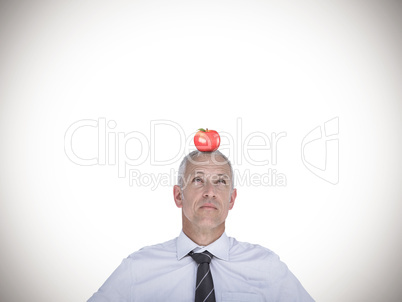 Composite image of businessman thinking