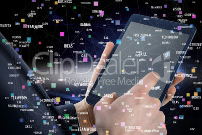 Composite image of businessman using digital tablet over white b