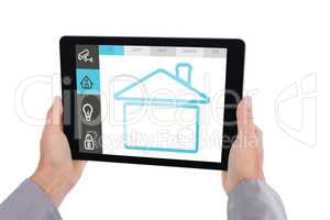 Composite image of cropped hand of man holding digital tablet