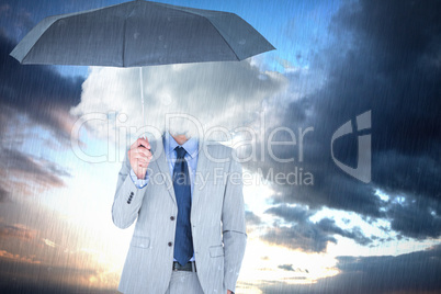 Composite image of smiling businessman looking at camera under u