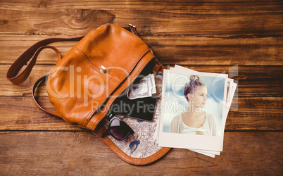 Composite image of woman holding coffee cup