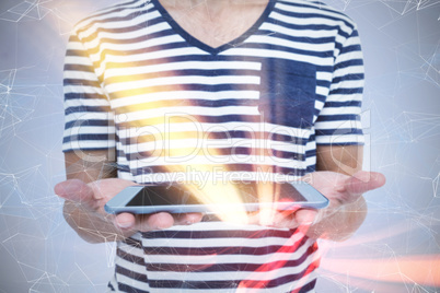 Composite image of close up of man holding tablet