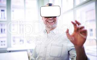 Smiling graphic designer using virtual reality headset