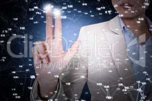 Composite image of businesswoman touching