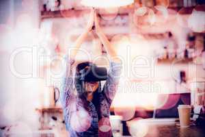 Young woman using the virtual reality headset