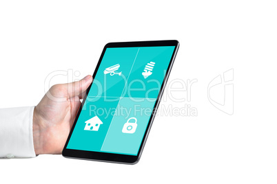 Composite image of man using tablet pc