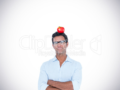 Composite image of confident man standing with arms crossed