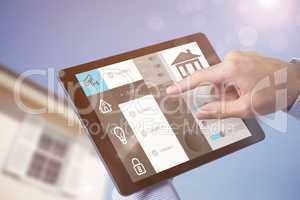 Composite image of man using tablet pc