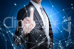 Composite image of businessman pointing with his finger