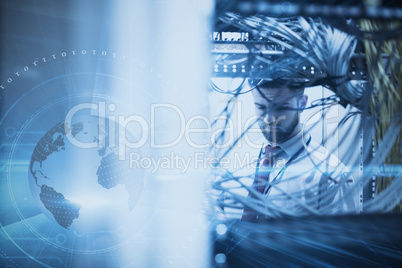 Composite image of man in a data center