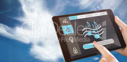 Composite image of man using tablet pc