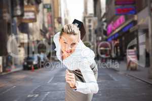 Composite image of businesswoman ready to run