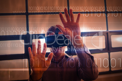 Composite image of blue technology design with binary code