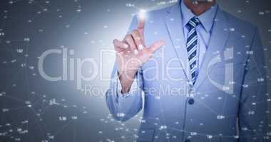 Composite image of midsection of businessman touching invisible