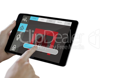 Composite image of man using tablet pc