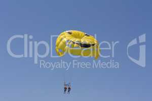 Sport activity Parasailing with smile in sky photo