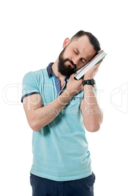 Image of man fell asleep while reading boring book