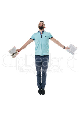 Knowledge inspire. Man with books posing jumping