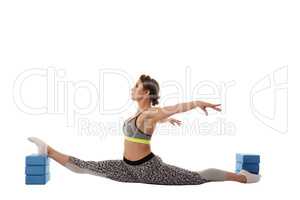 Image of gymnast exercising using gymnastic bricks