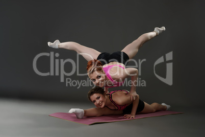 Photo of sports women pose during exercise