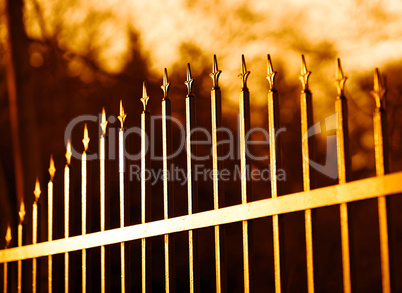 Diagonal sunset fence bokeh background