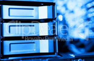 Horizontal blue data storage array bokeh background