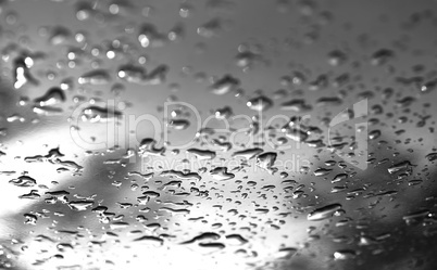 Black and white water drops after rain bokeh background