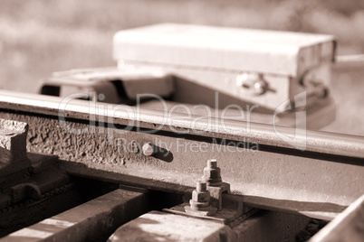Railway maintenance toolkit sepia bokeh background