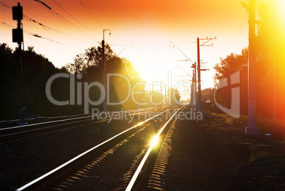 Sunset railway with light leak  landscape background