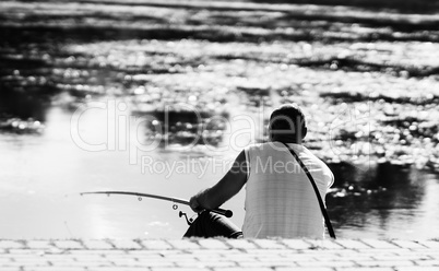 Horizontal black and white fisherman bokeh background