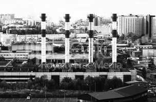 Horizontal black and white industrial chimneys Moscow cityscape