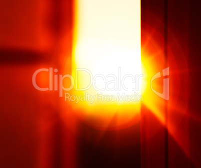 Horizontal vivid sunset light flare through window abstract back