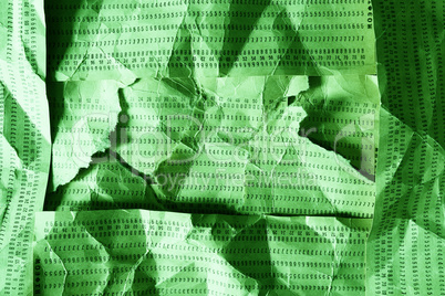 Horizontal green crumpled punched cards composition