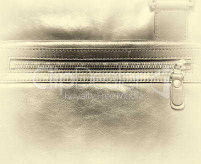 Horizontal vintage leather case with zipper vignette background