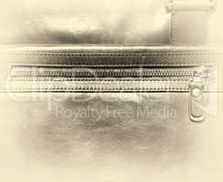 Horizontal vintage leather case with zipper vignette background