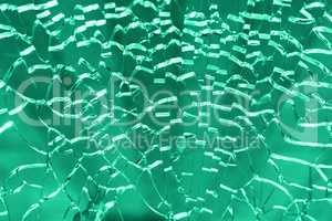 Horizontal broken green ice glass textured backdrop